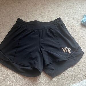 Black Wake Forest Lululemon Hotty Hot Shorts (Size 6/ Length 4”) WORN ONCE